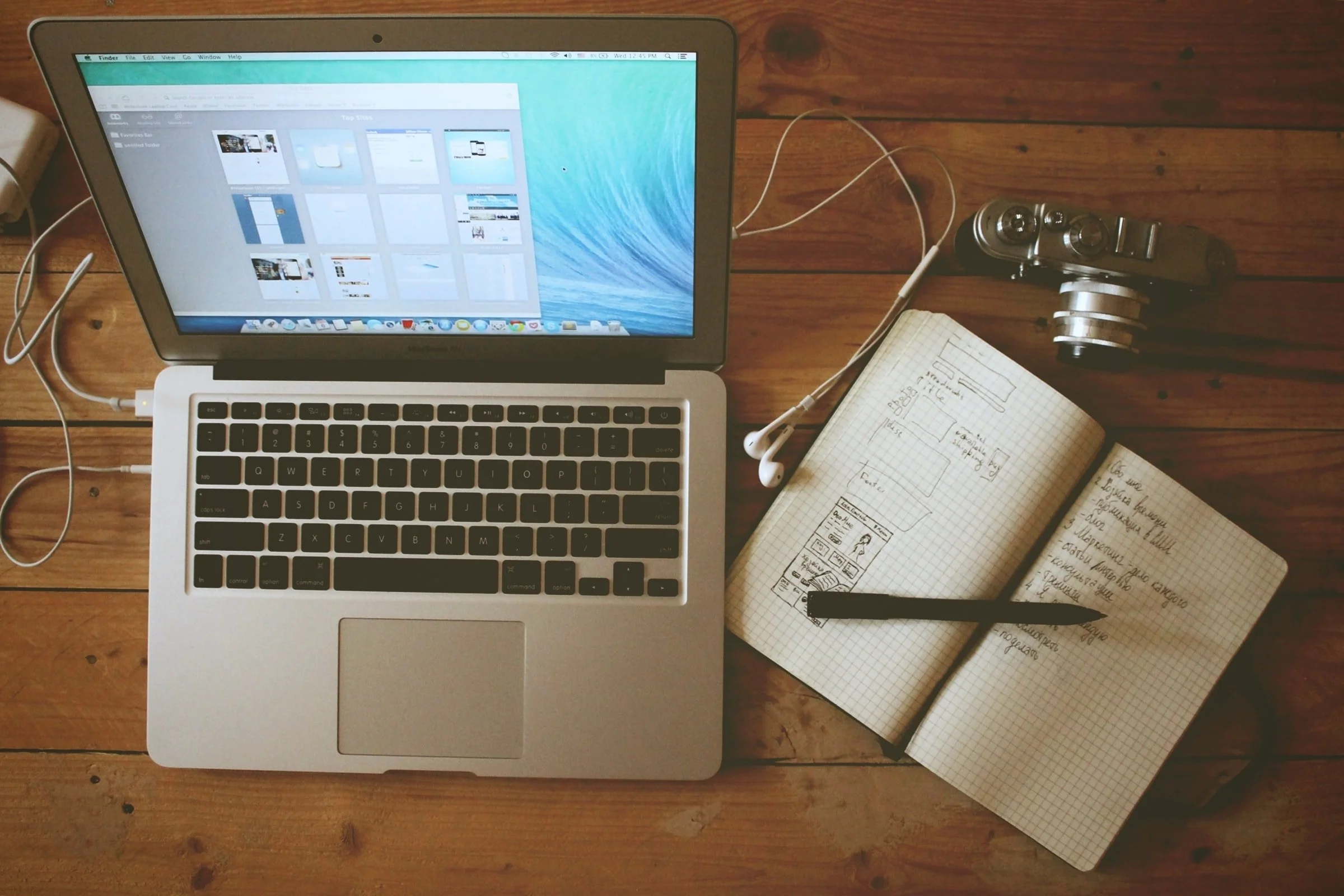 Qa Process With Computer And Notebook for The importance of QA in Soluntech's development processes