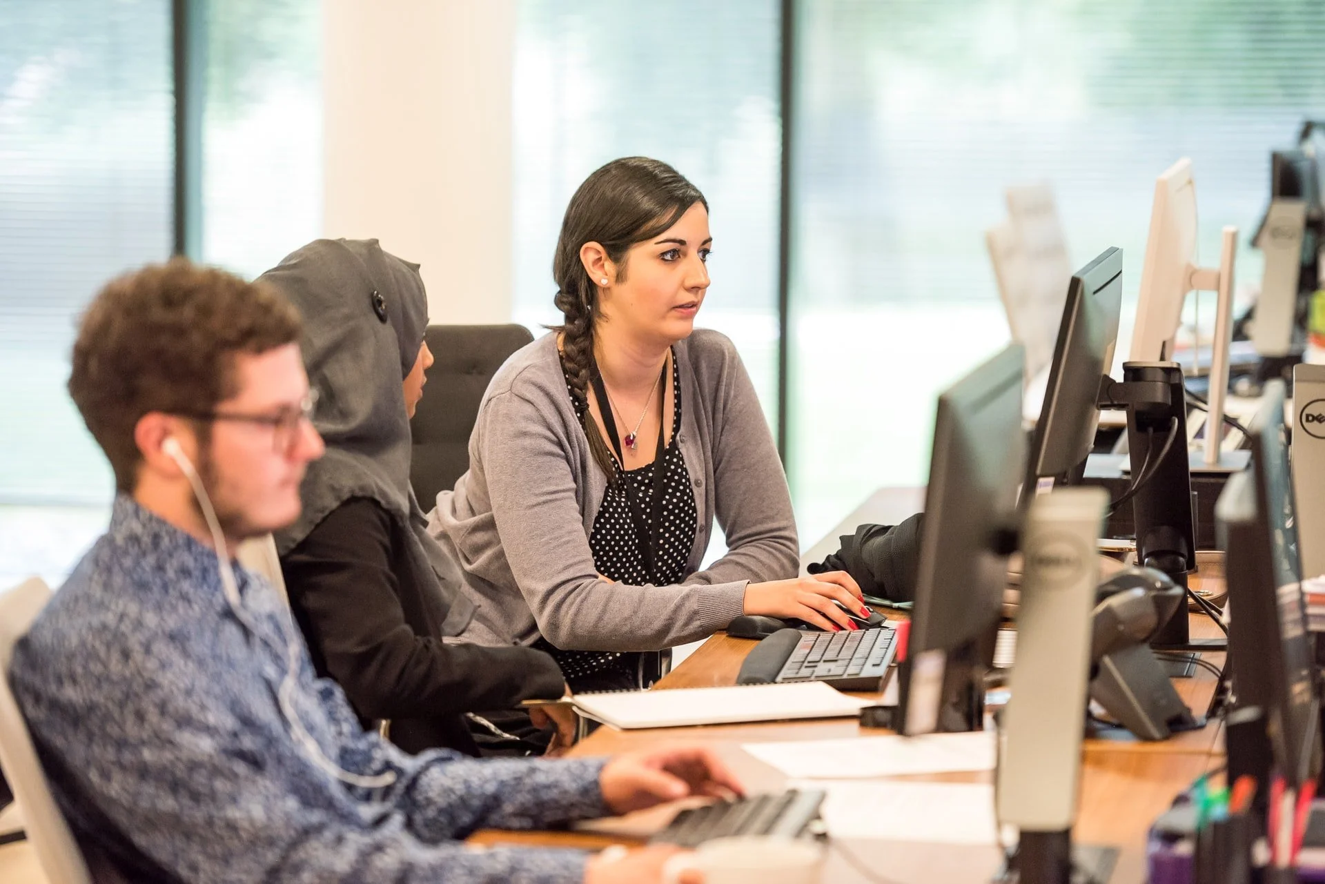 Working Employees for Top 5 Benefits of Low Code Development