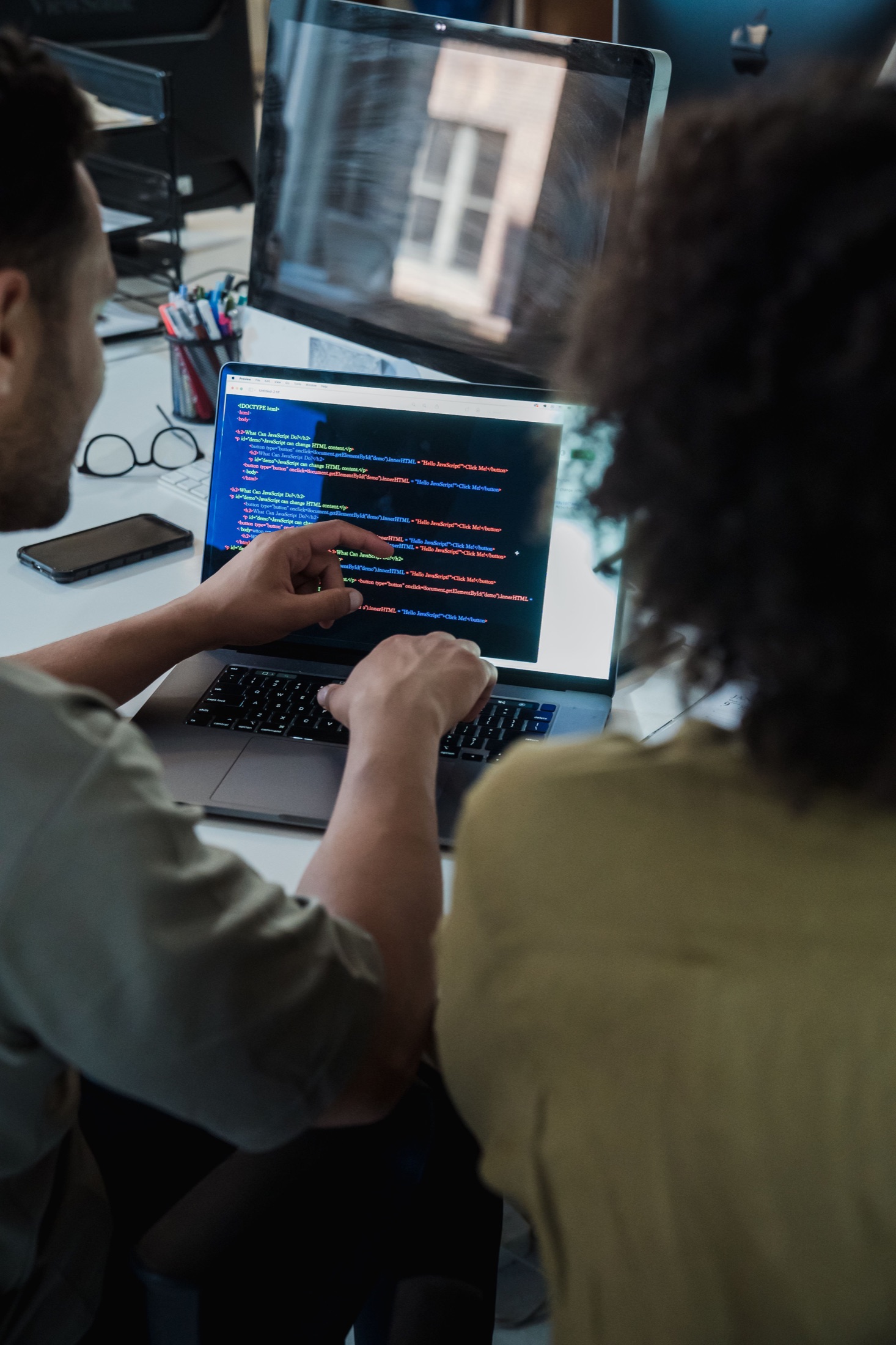 Engineers reviewing software architecture and production readiness