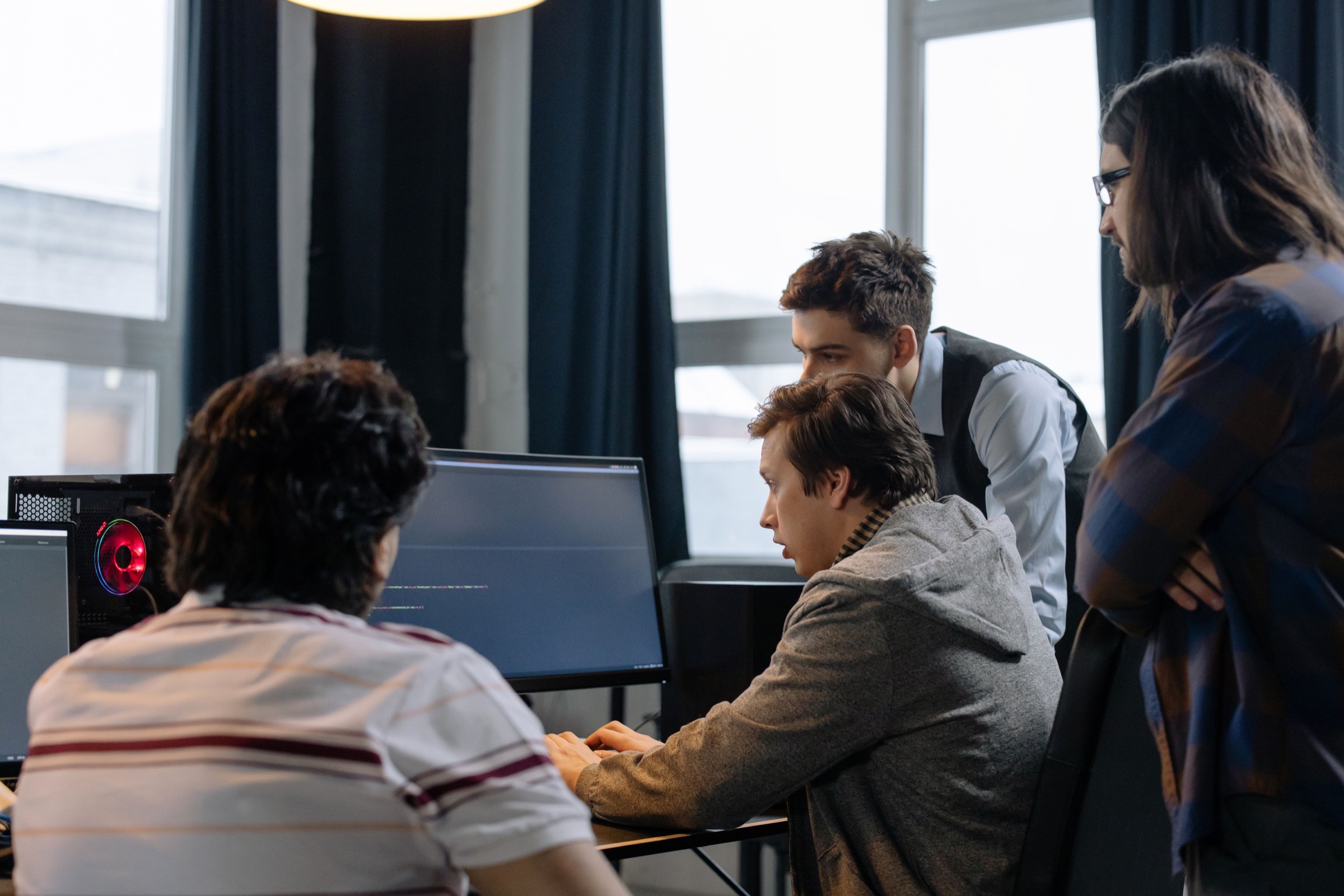 Dedicated engineering team collaborating on a production system